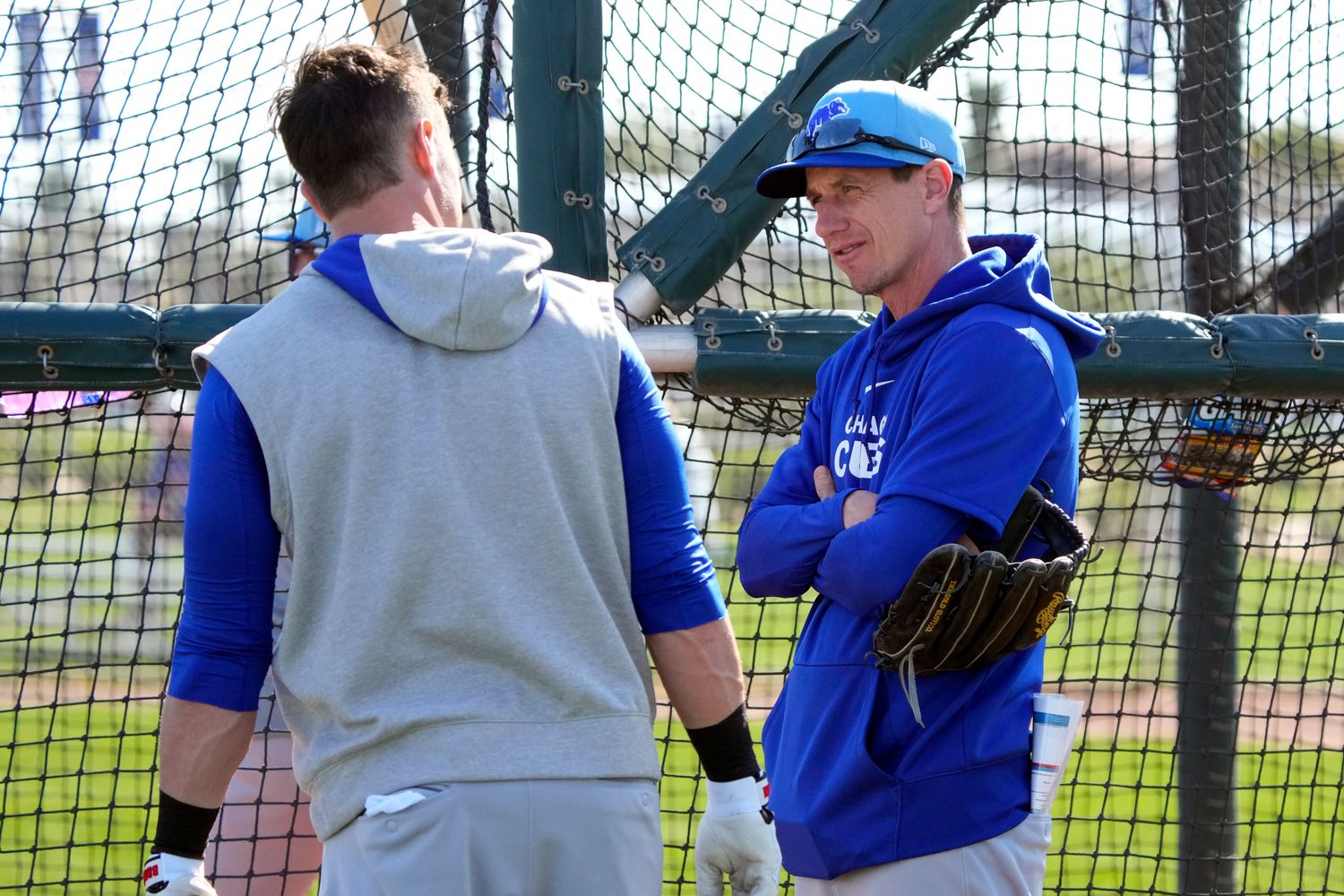 Feb 18, 2024; Mesa, AZ, USA; Chicago Cubs manager Craig Counsell talks to catcher Yan Gomes (15) during Spring Training camp at Sloan Park.